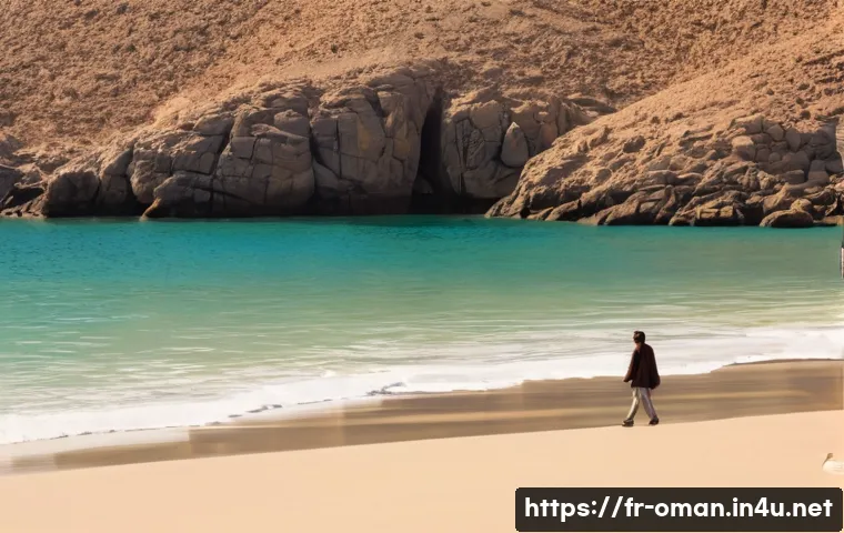 오만의 환경 보호 노력 - A serene coastal nature reserve scene at Ras Al Jinz in Oman during sunrise, showcasing a sandy beac...
